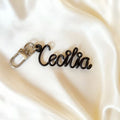 Personalized hand-bent wire name pendant in anodized aluminum, custom letter charm for bag, phone, or keychain