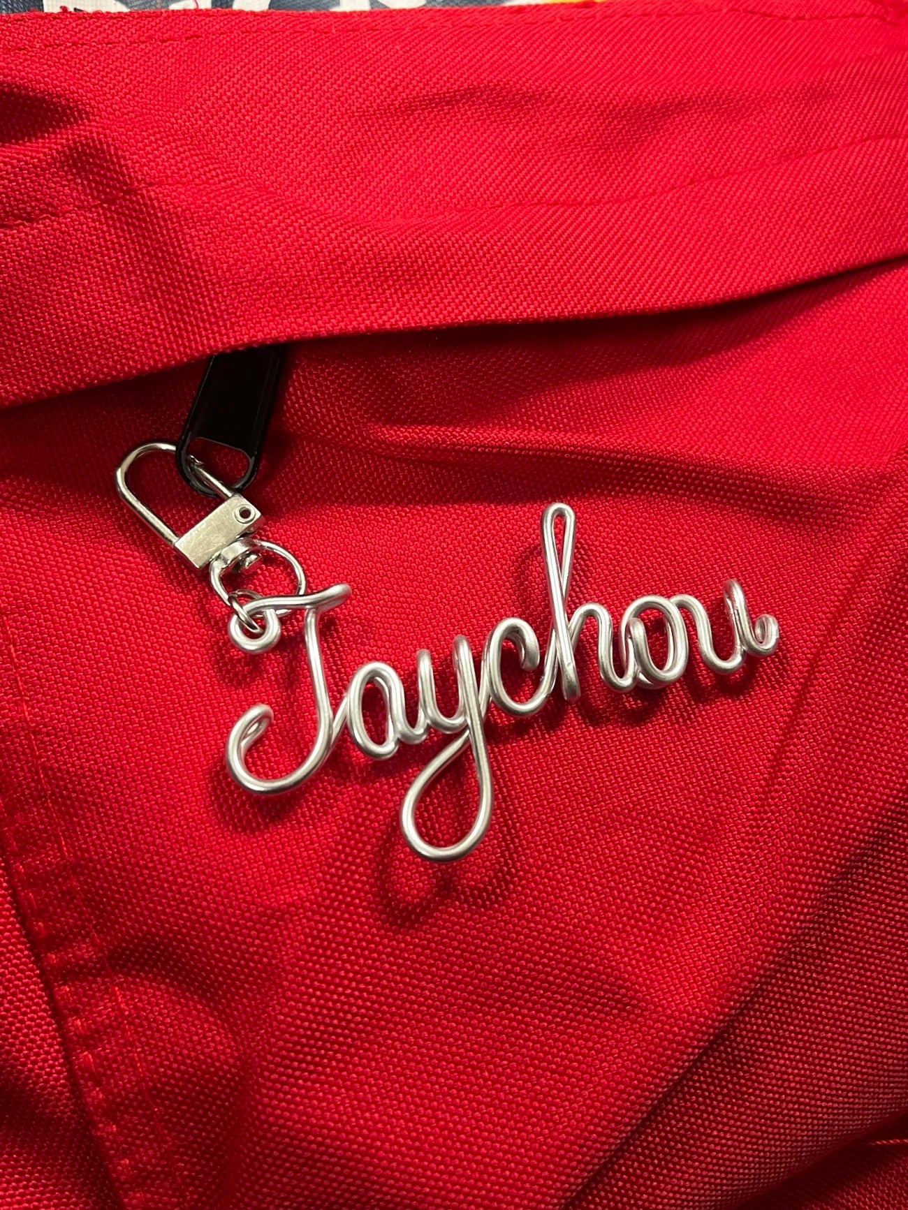 Personalized hand-bent wire name pendant with custom alphabet letter charm for bags, phones, or keychains by Miniic Shop.
