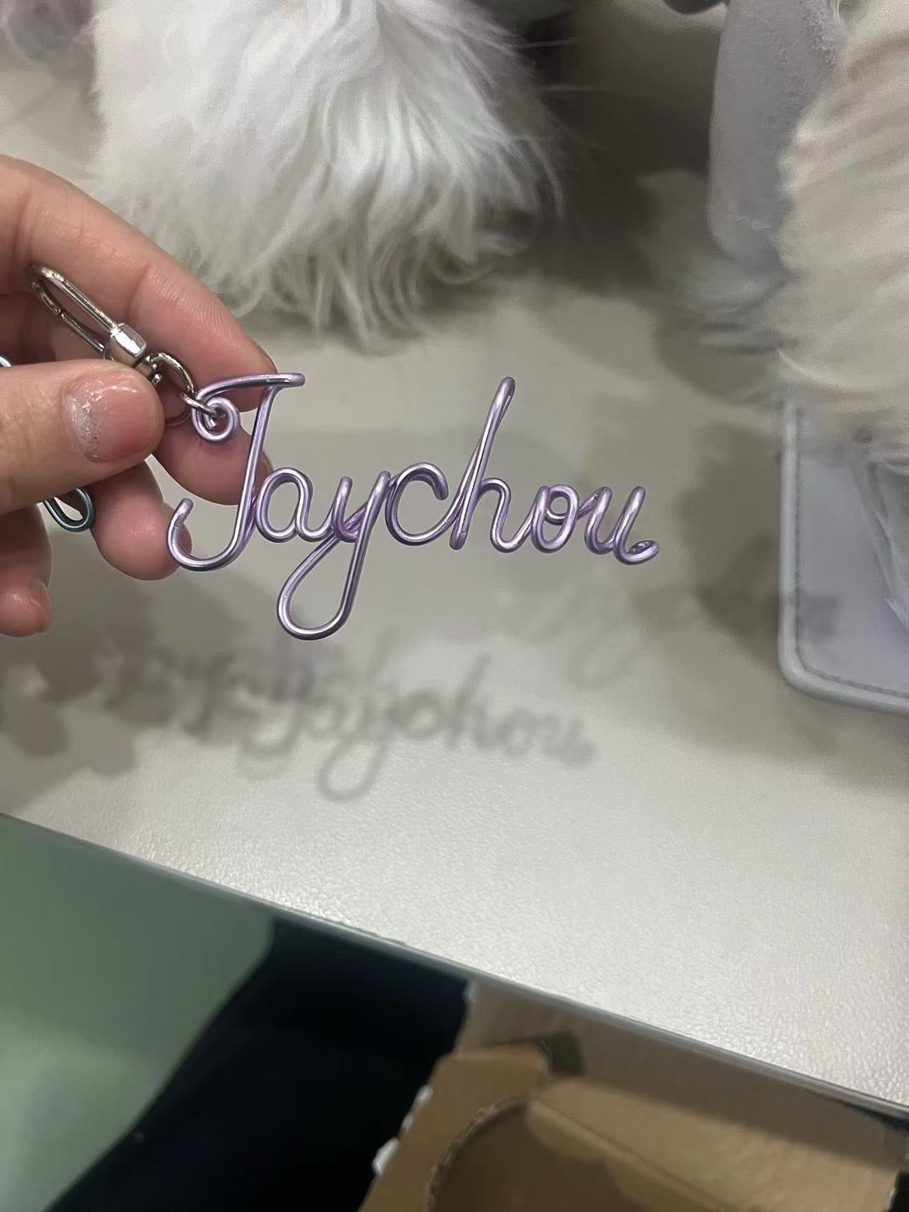 Personalized Miniic Shop hand-bent wire name pendant with custom alphabet letter charm for bags, phones, or keychains.