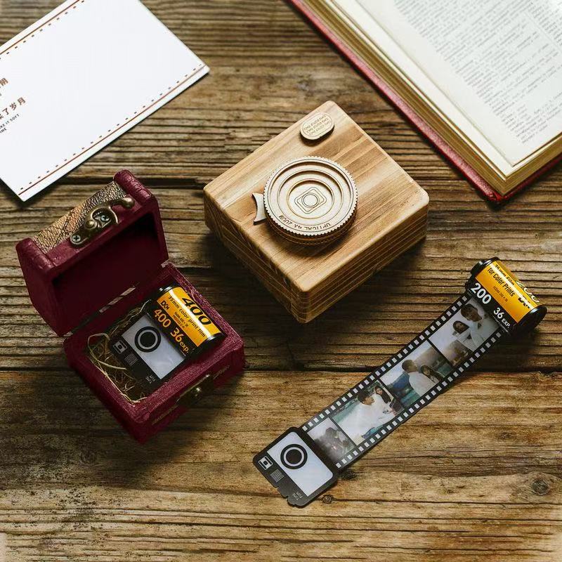 Creative DIY Memory Film Roll Album by Miniic Shop, showcasing a colorful, handcrafted photo gift with film roll design and decorative pages.