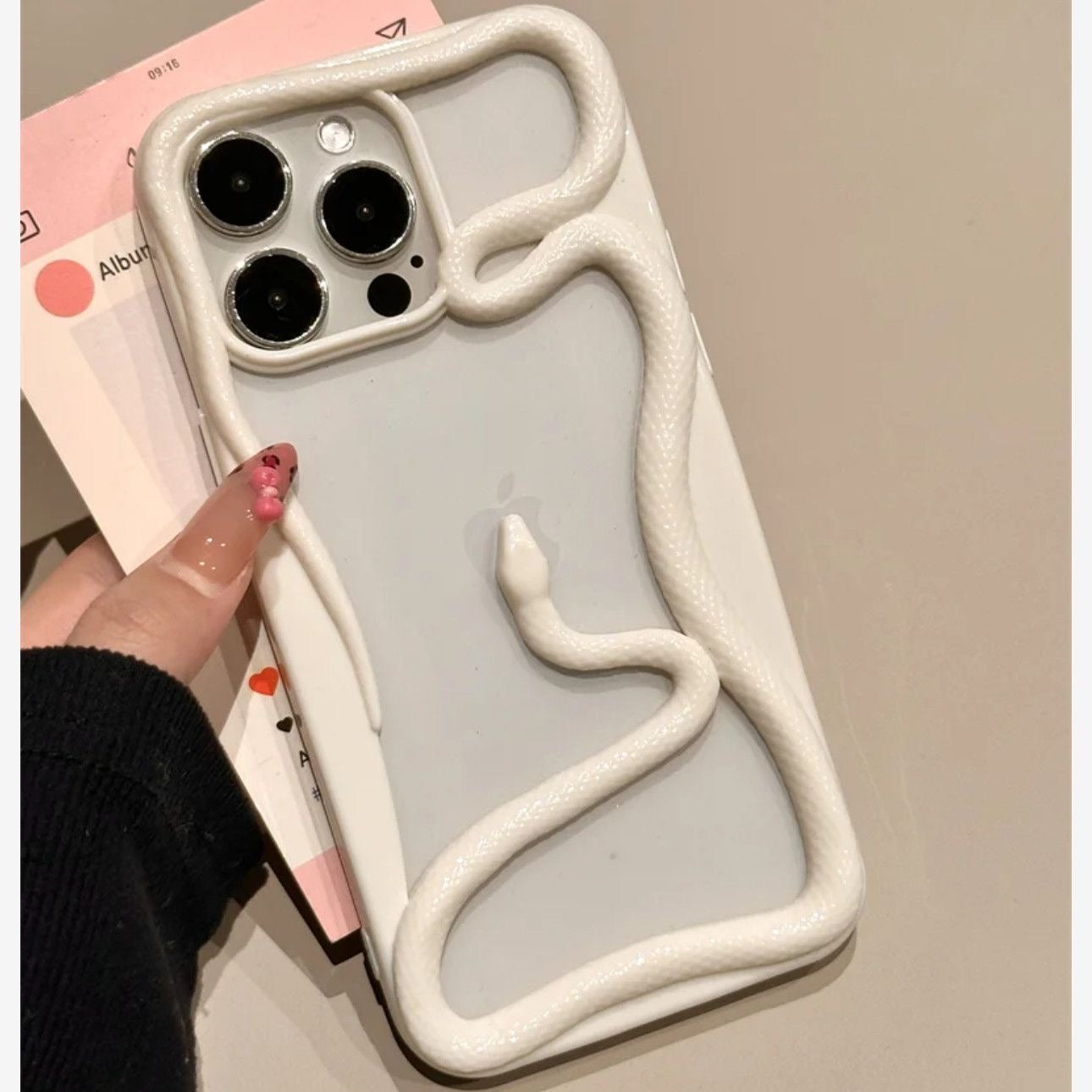 Miniic Shop 3D Snake Hollow phone case, ultra-thin and bare feel, shown on a smartphone with a sleek, modern design.