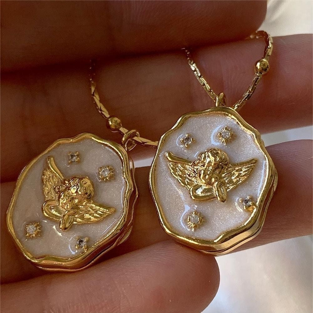 Custom photo angel locket necklace by Miniic Shop featuring a silver-toned pendant with a photo insert and delicate chain.