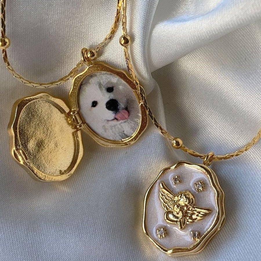 Custom photo angel locket necklace from Miniic Shop featuring a silver-tone pendant with a small angel design and space for a photo.
