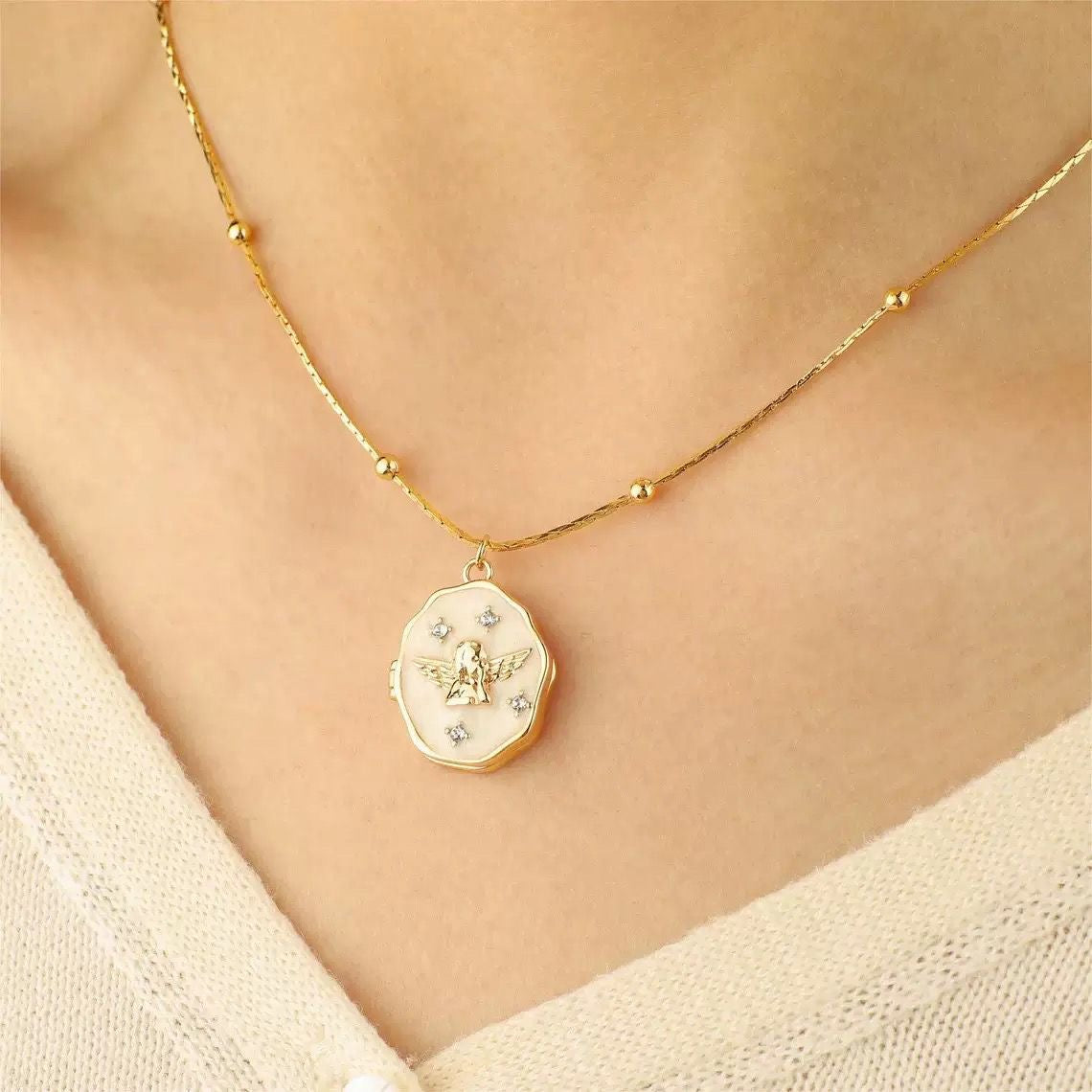 Custom photo angel locket necklace by Miniic Shop, featuring a silver pendant with a personalized photo insert and angel design.