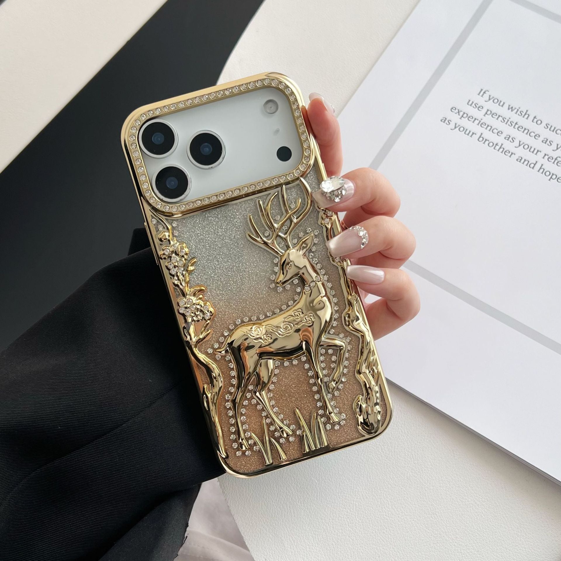 Gold 3D Elk hollow phone case by Miniic Shop, electroplated protective cover with intricate elk design for iPhone and smartphone.