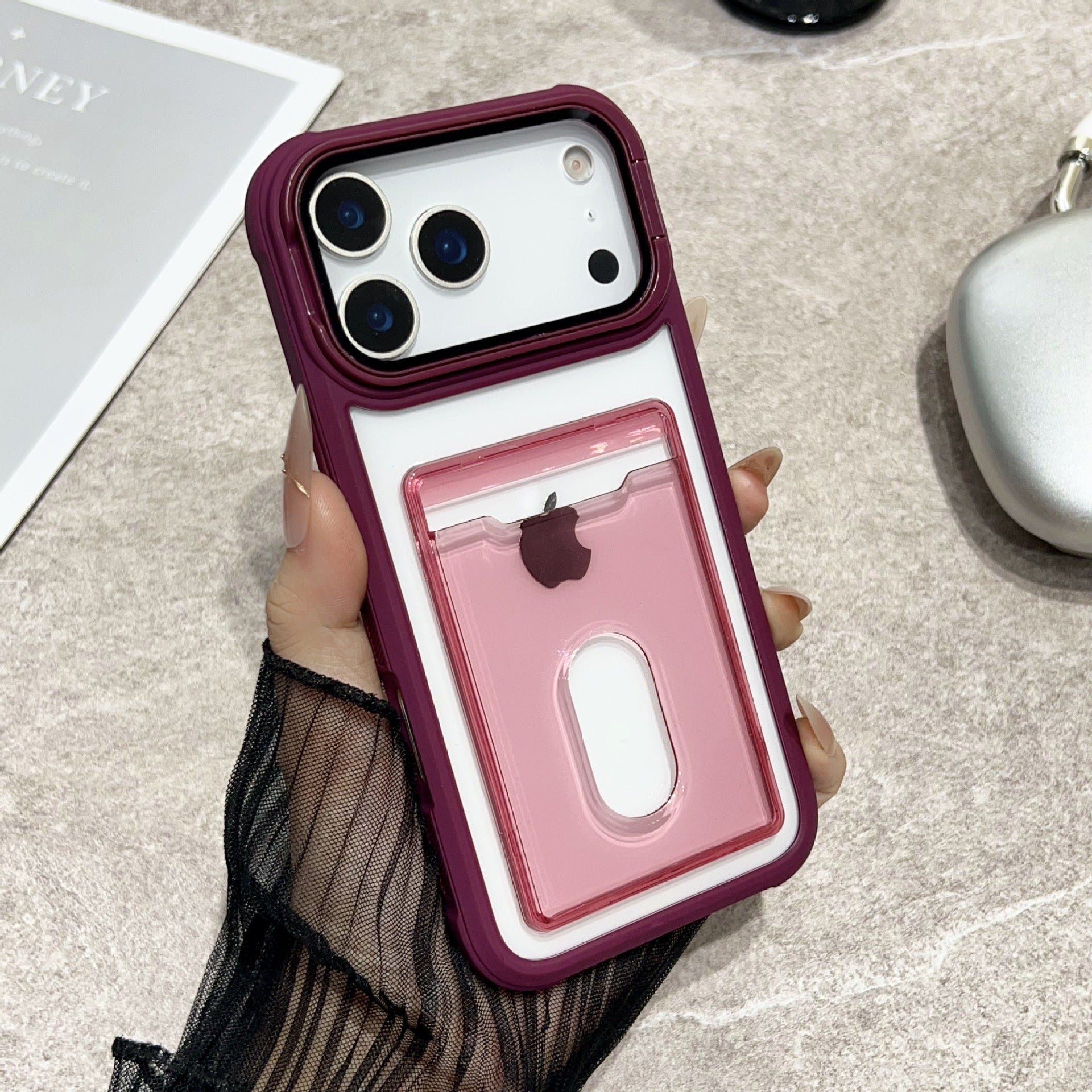 Clear Miniic Shop iPhone case with card slot and kickstand, showing the transparent design and functional features.