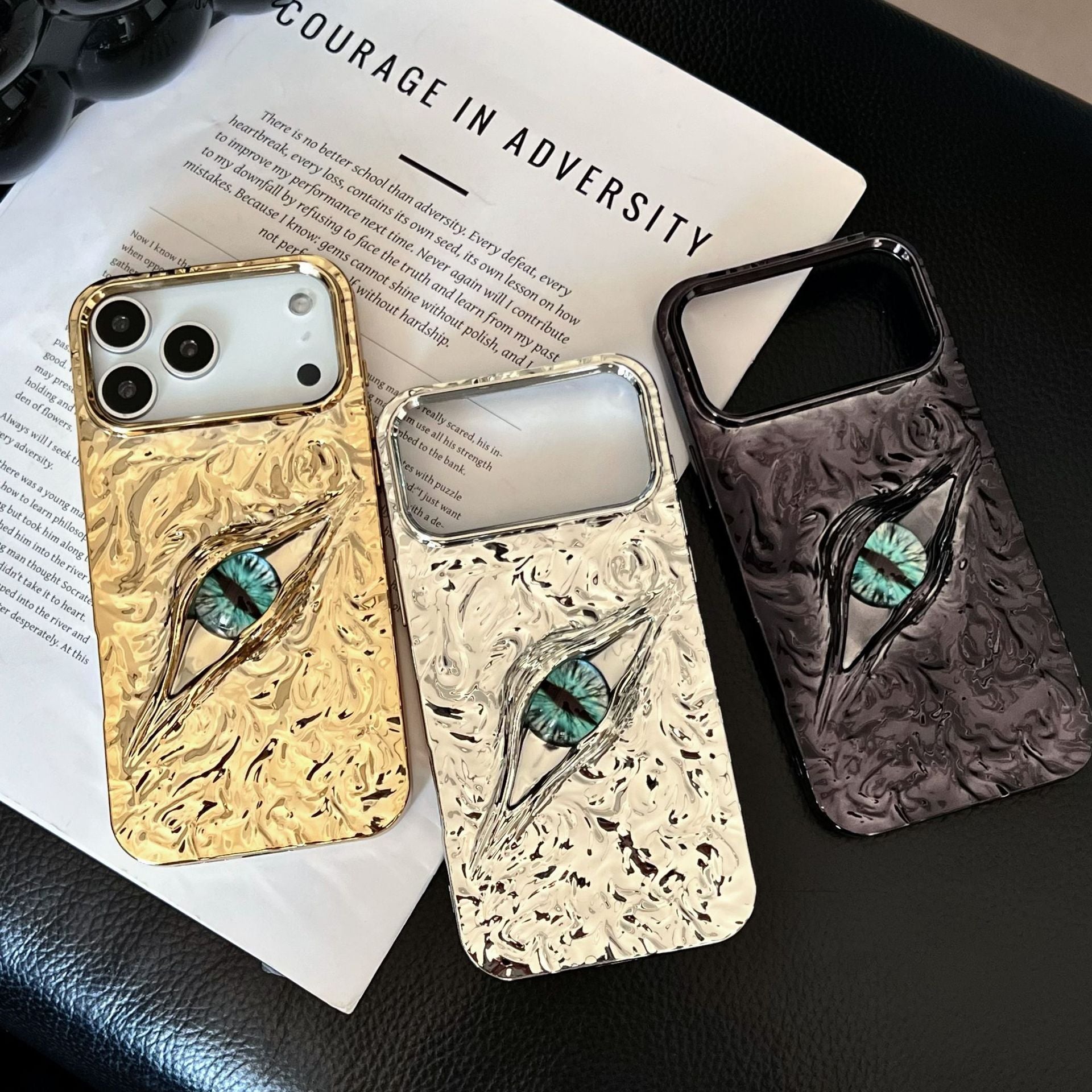 Miniic Shop 3D Evil Eye textured phone case with shockproof design, featuring vibrant evil eye pattern and protective features.