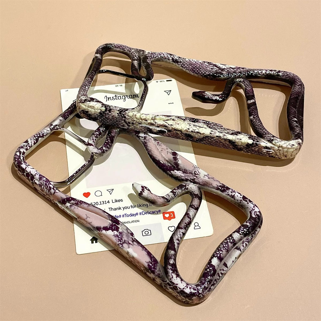 Snake print hollow out phone case with wavy frame design, aesthetic cover by Miniic Shop for stylish smartphone protection.