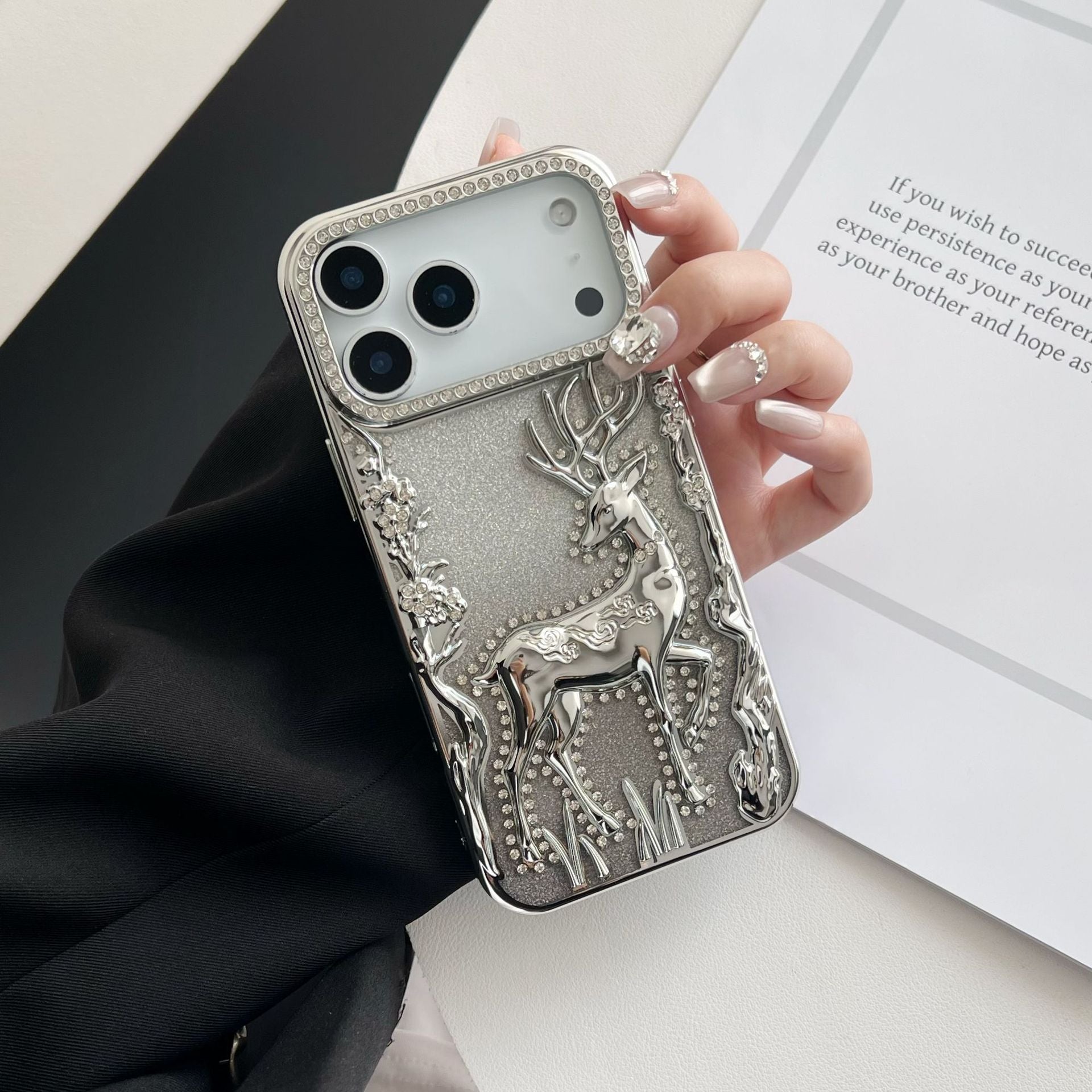 Gold 3D elk hollow phone case by Miniic Shop with electroplated finish, designed for iPhone, featuring detailed elk silhouette.