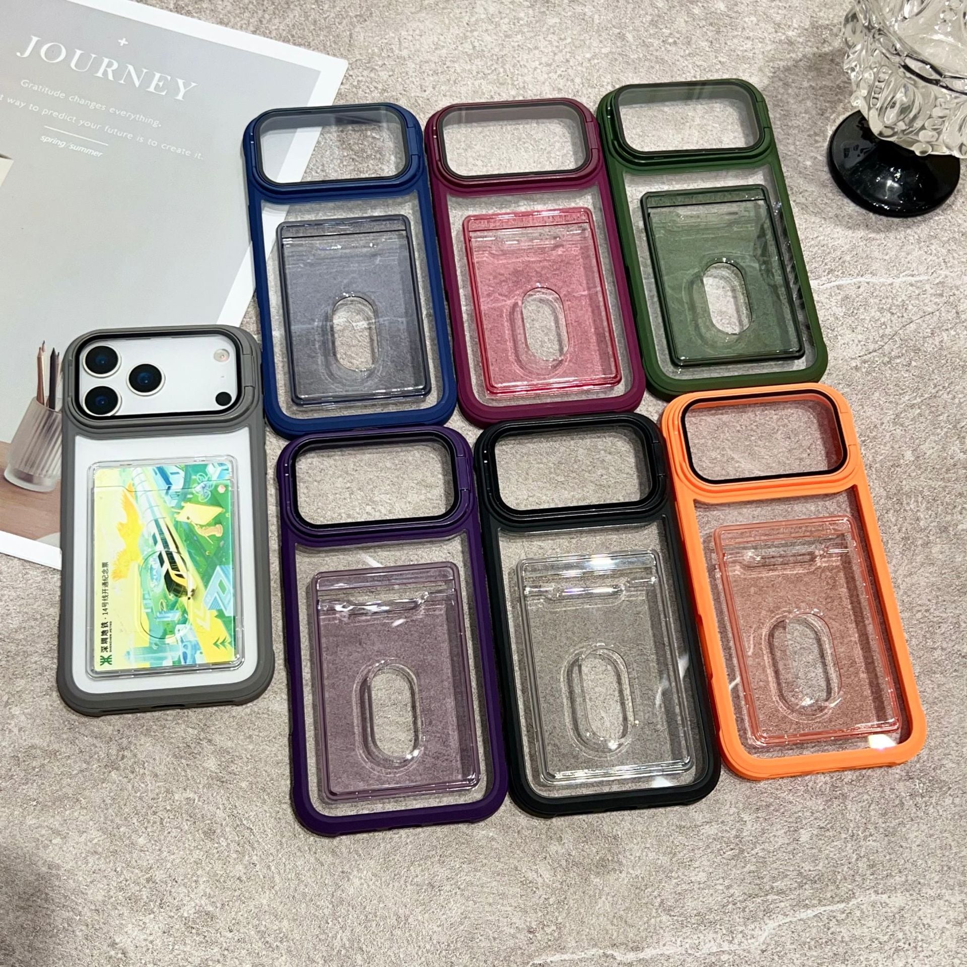 Clear iPhone case with card slot, flip kickstand camera cover, acrylic back, and soft bumper edges